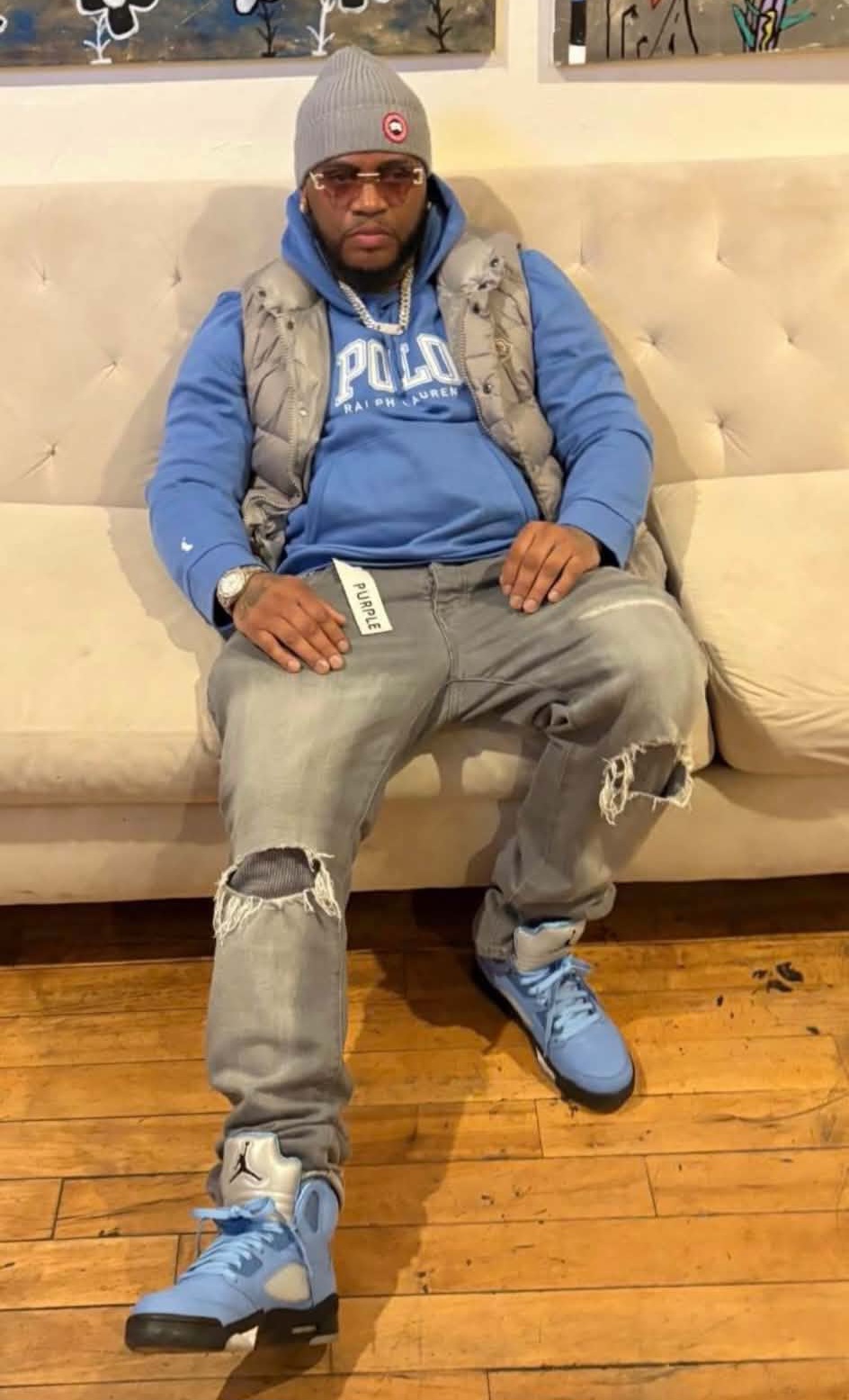K-Mafia in a blue Polo hoodie